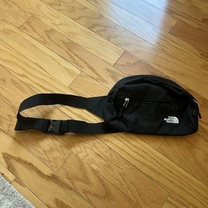 Black north face sling bag